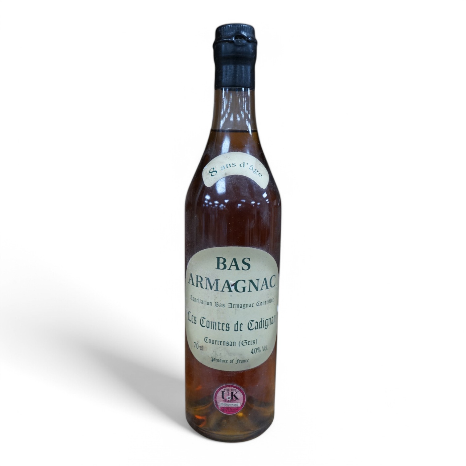 A bottle of Les Comtes De Cadignan Bas Armagnac. Condition - fair, from a local private cellar